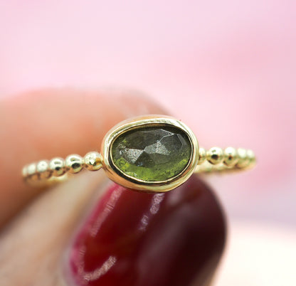 Gouden ring met groene toermalijn